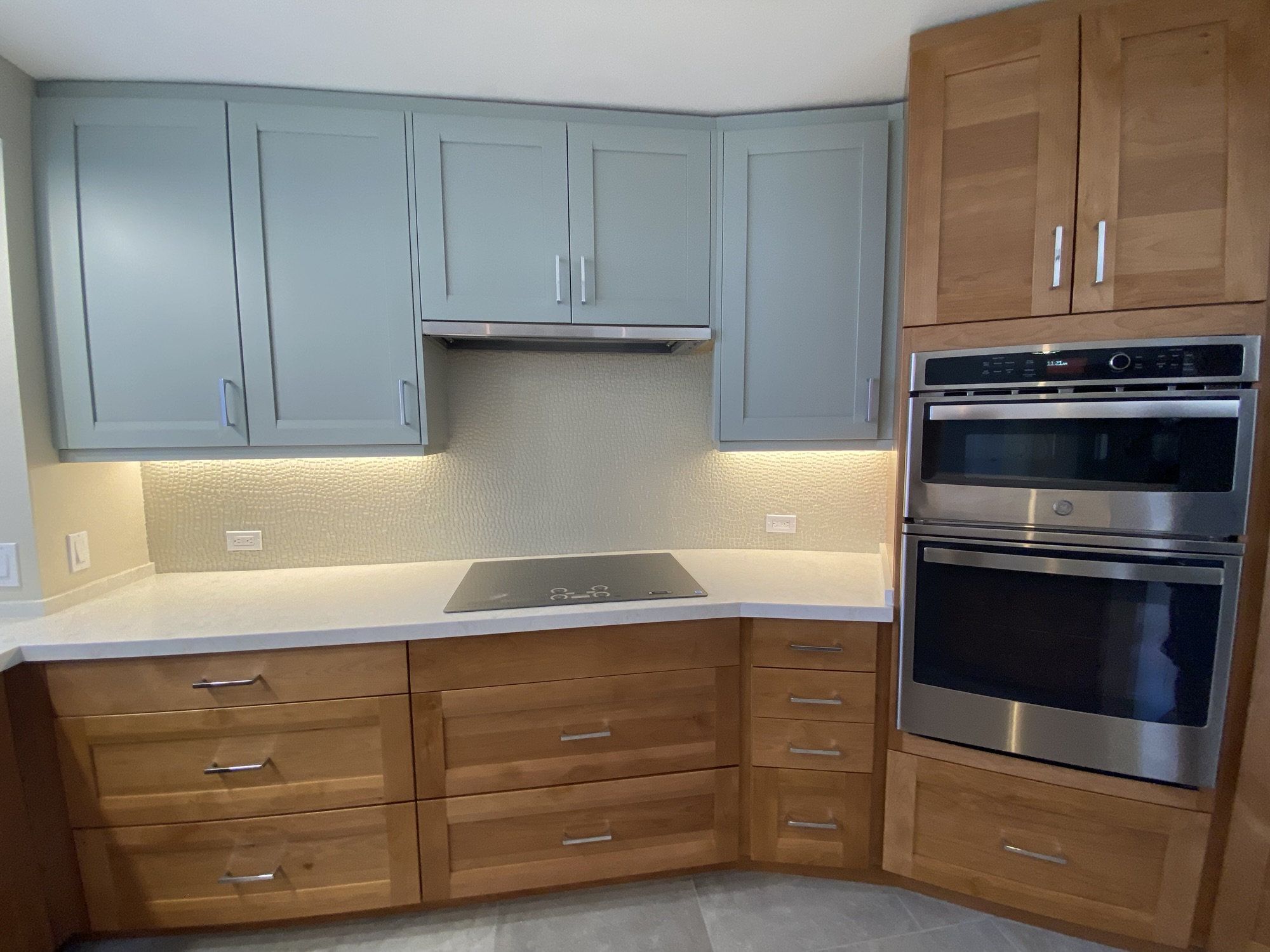 Custom kitchen cabinetry and finishes by Trademark Construction